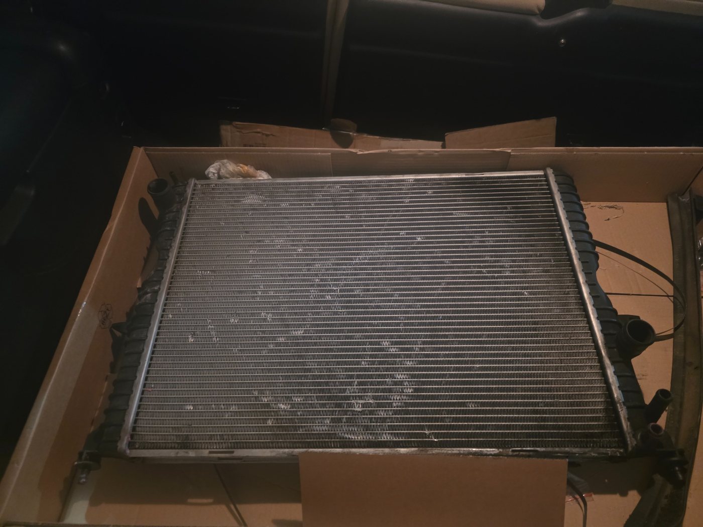 Radiator and cooling system component